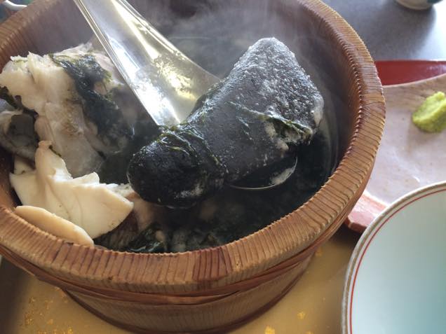 木桶内の熱した石